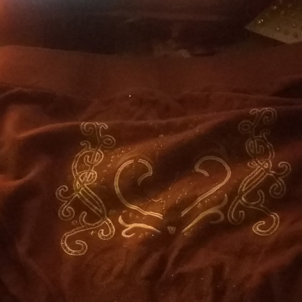I am selling an brown customized skirt or shirt